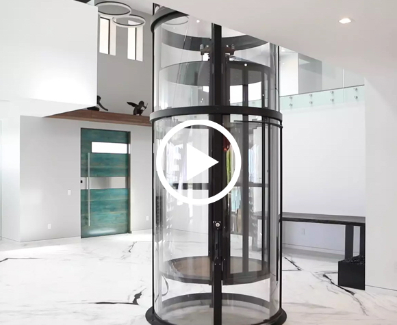 Vuelift-round-home-elevator-descends-to-luxury-foyer-play